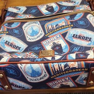 Dooney & Bourke Blue and Red Shoulder Bag with Travel-Inspired Design